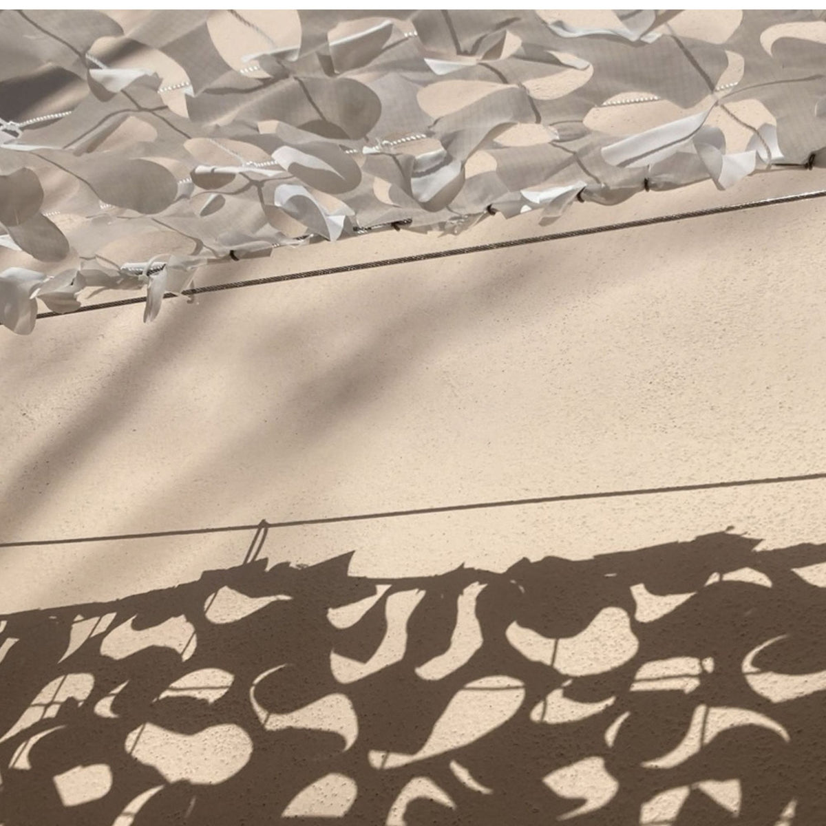 Câble acier pour voile d'ombrage camouflage